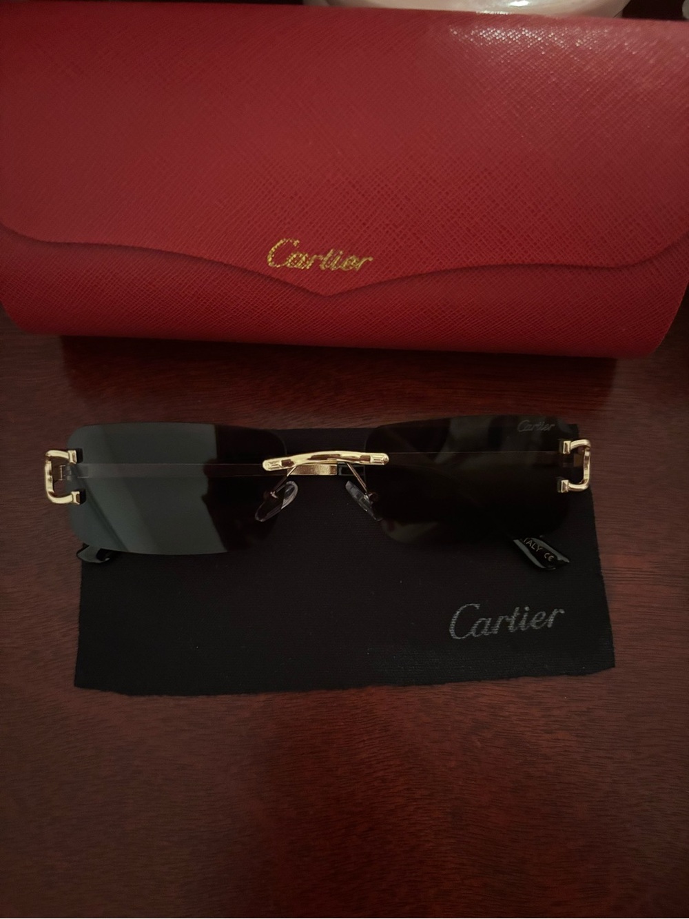 Rimless Cartier Sunglasses in Black and Gold-Tone